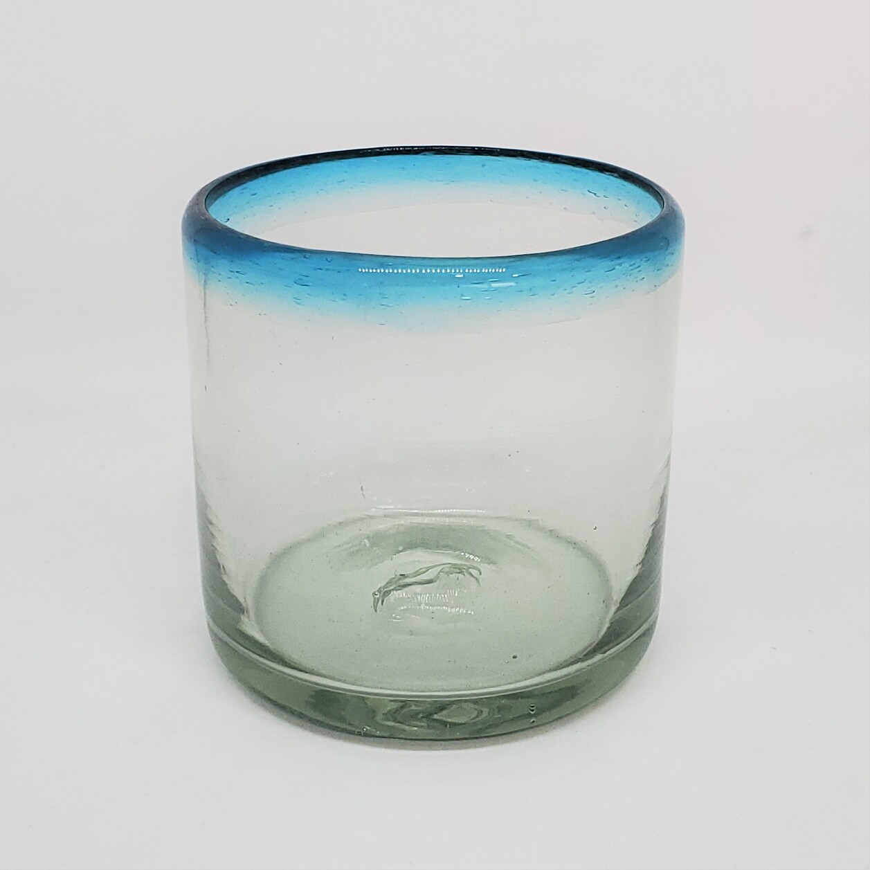 Wholesale Colored Rim Glassware / Aqua Blue Rim 8 oz DOF Rocks Glasses  / These glasses are just the right size to enjoy fresh squeezed fruit juice in the moning.